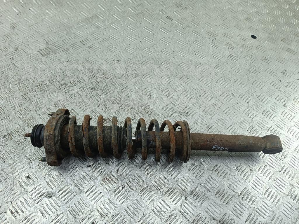 Амортизатор задний левый