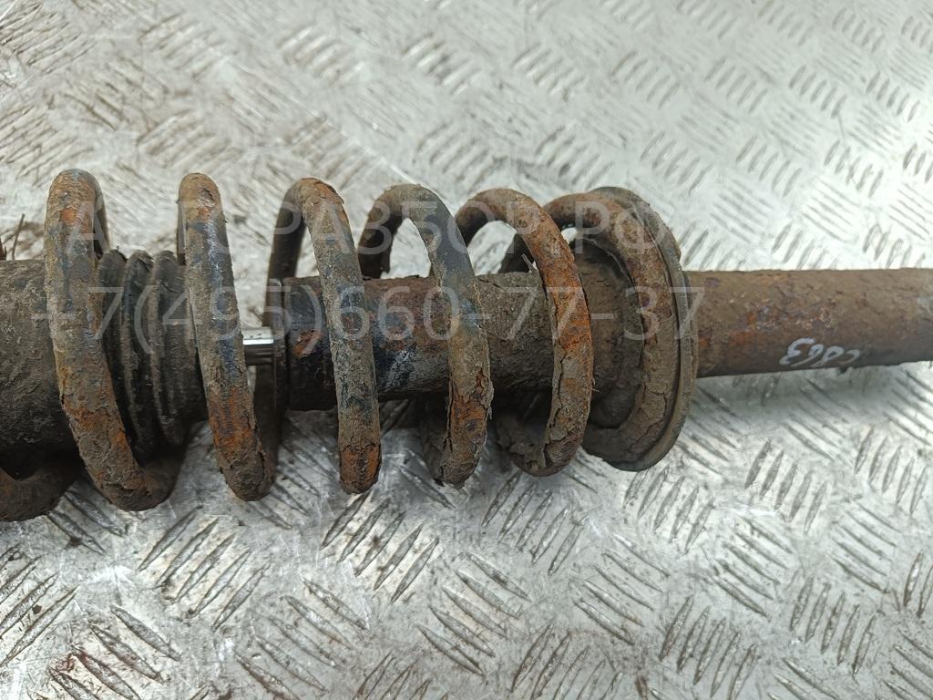 Амортизатор задний левый