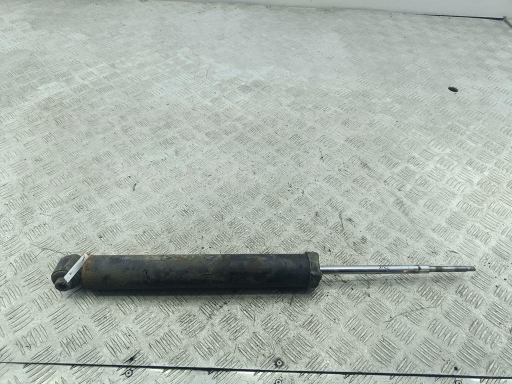 Амортизатор задний левый