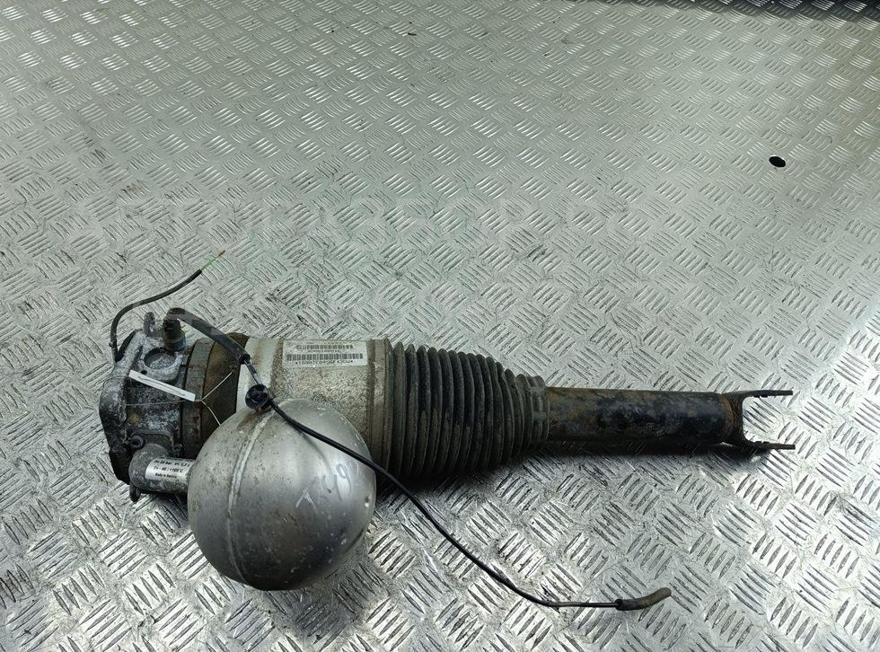 Амортизатор задний левый