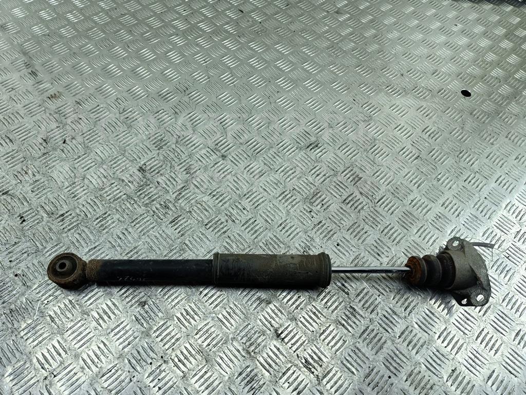 Амортизатор задний левый