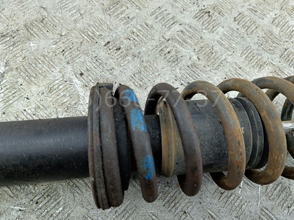 Амортизатор задний левый