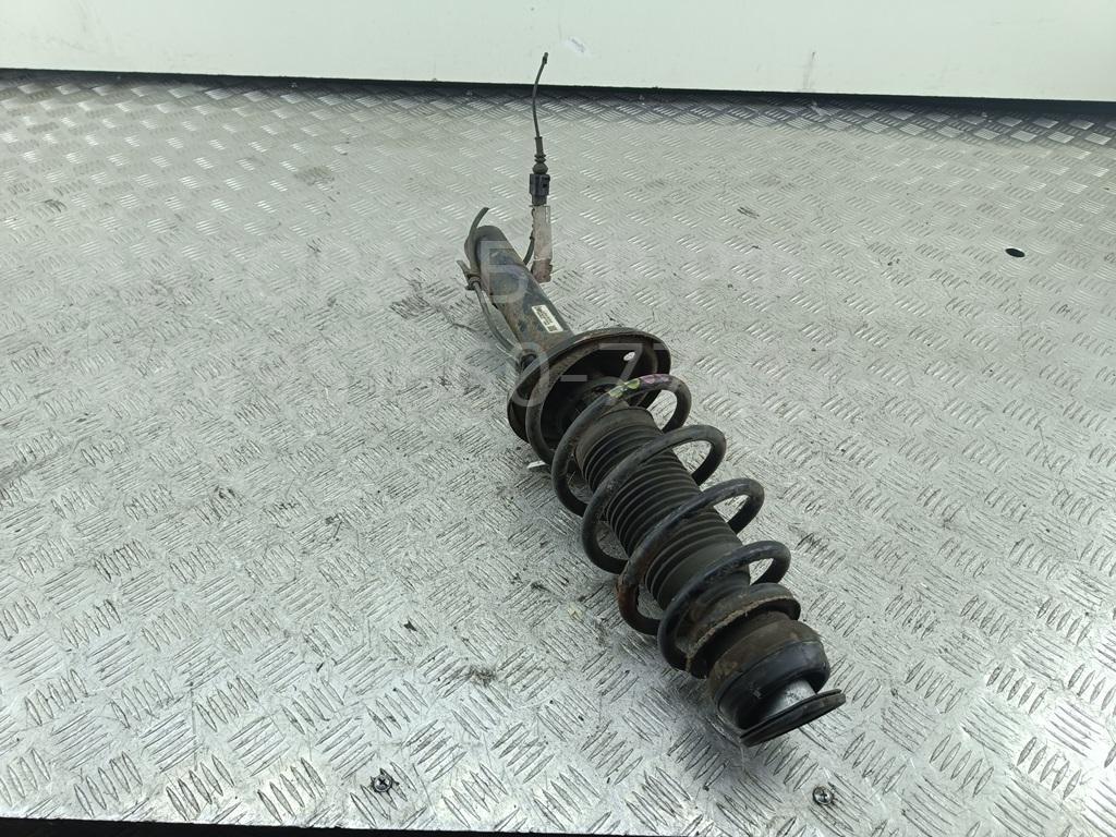 Амортизатор передний левый