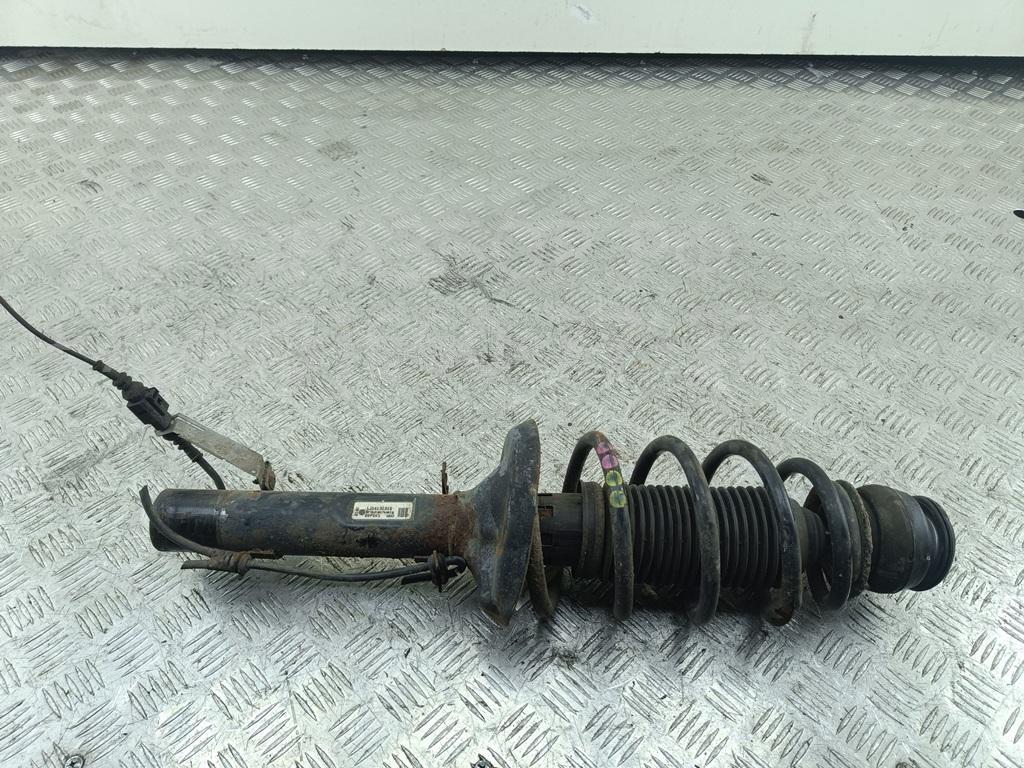 Амортизатор передний левый