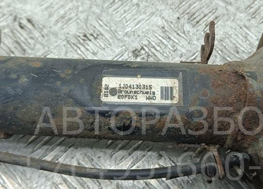 Амортизатор передний левый