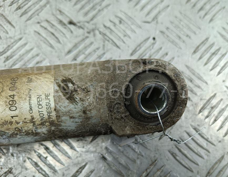 Амортизатор задний левый