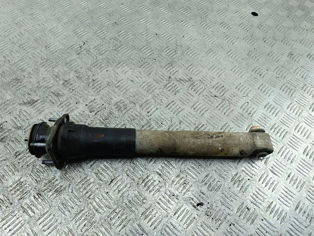 Амортизатор задний левый