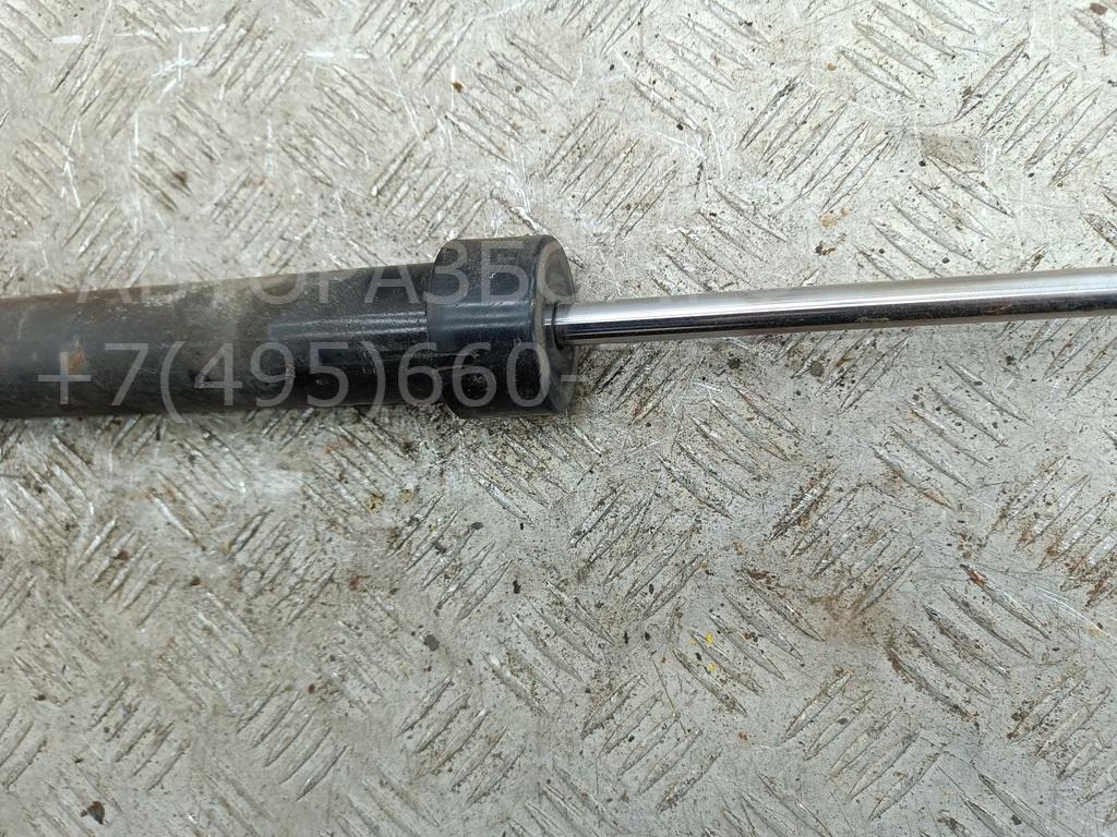 Амортизатор задний левый