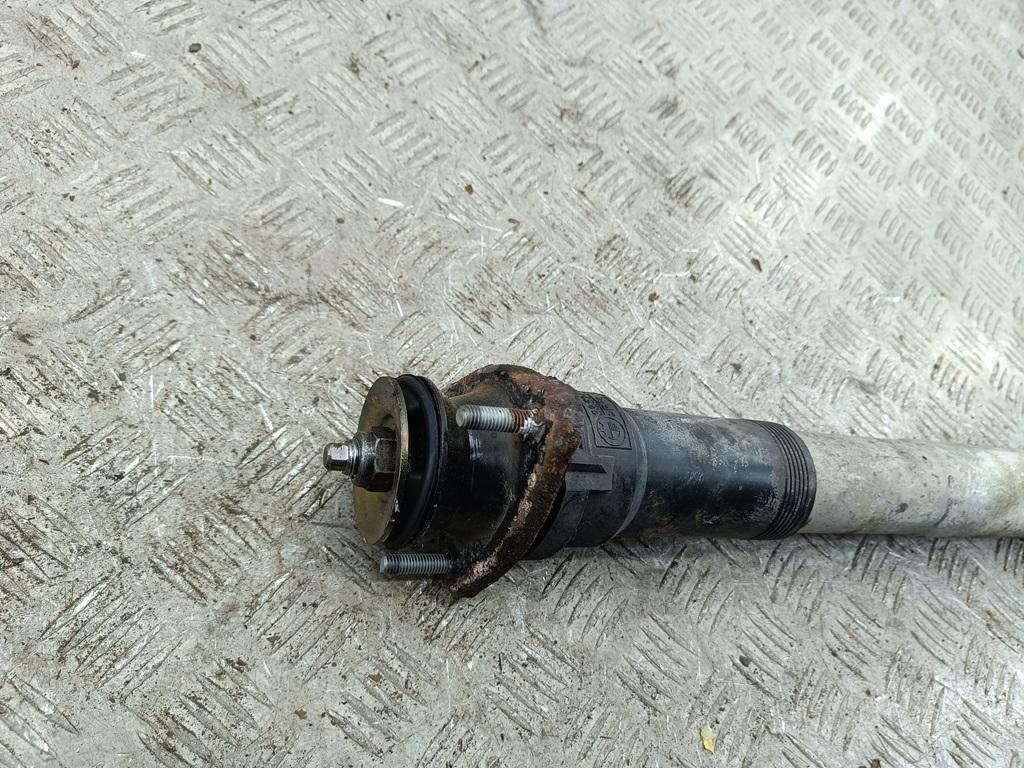 Амортизатор задний левый