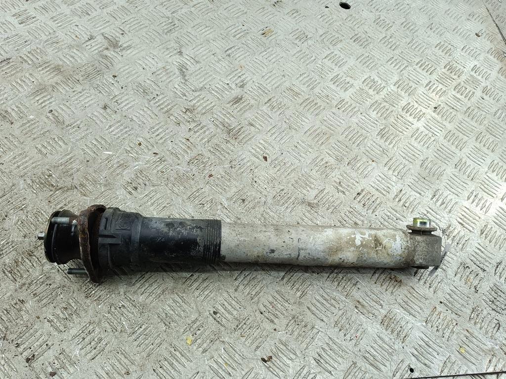 Амортизатор задний левый