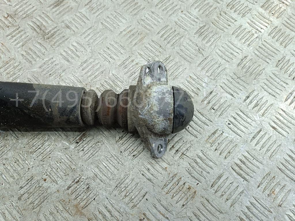 Амортизатор задний левый