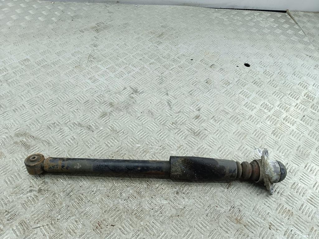 Амортизатор задний левый