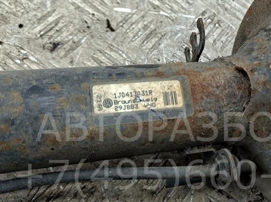 Амортизатор передний левый