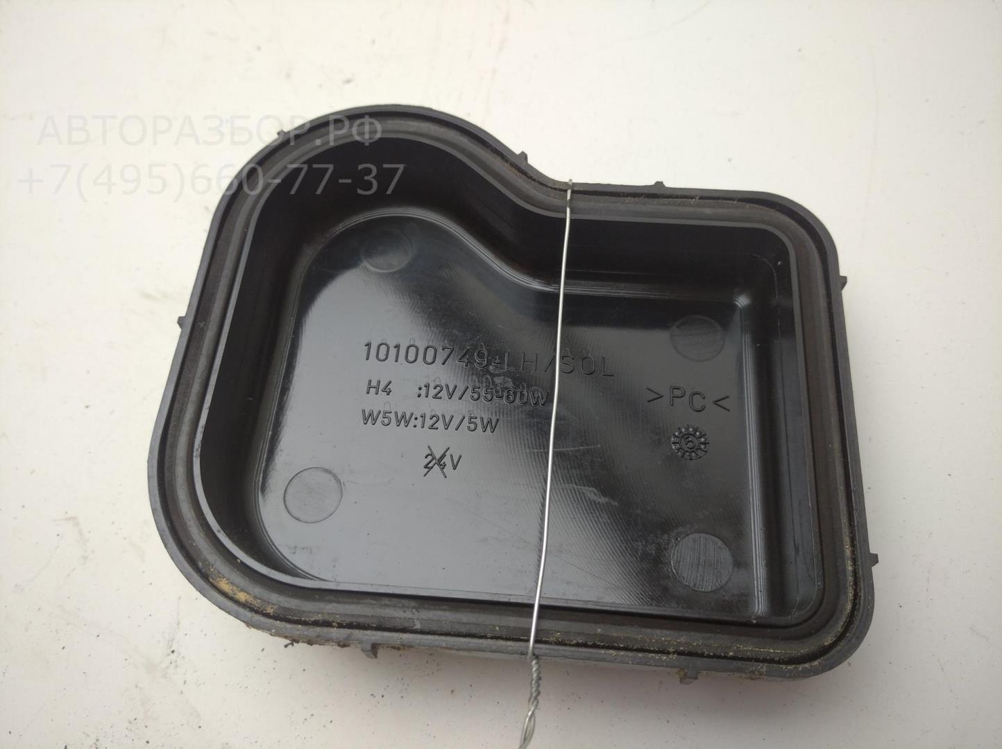 Крышка фары левой