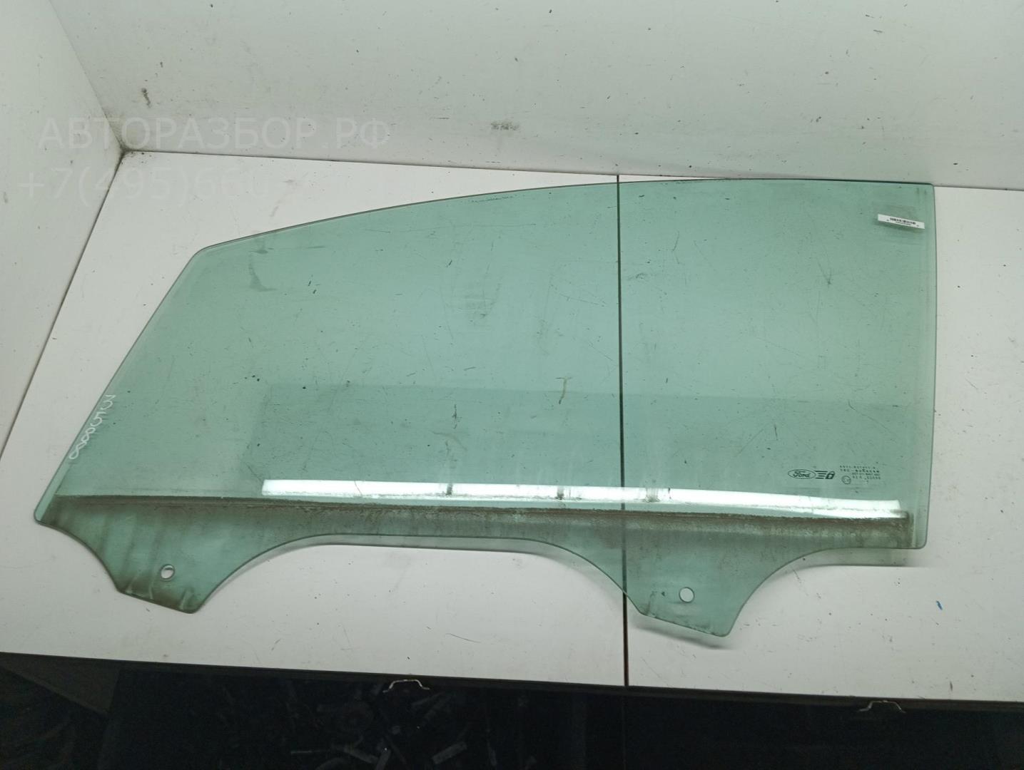 Стекло двери передней левой