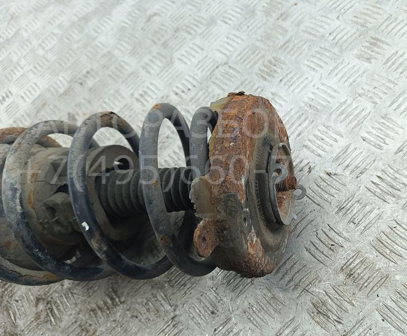 Амортизатор передний левый