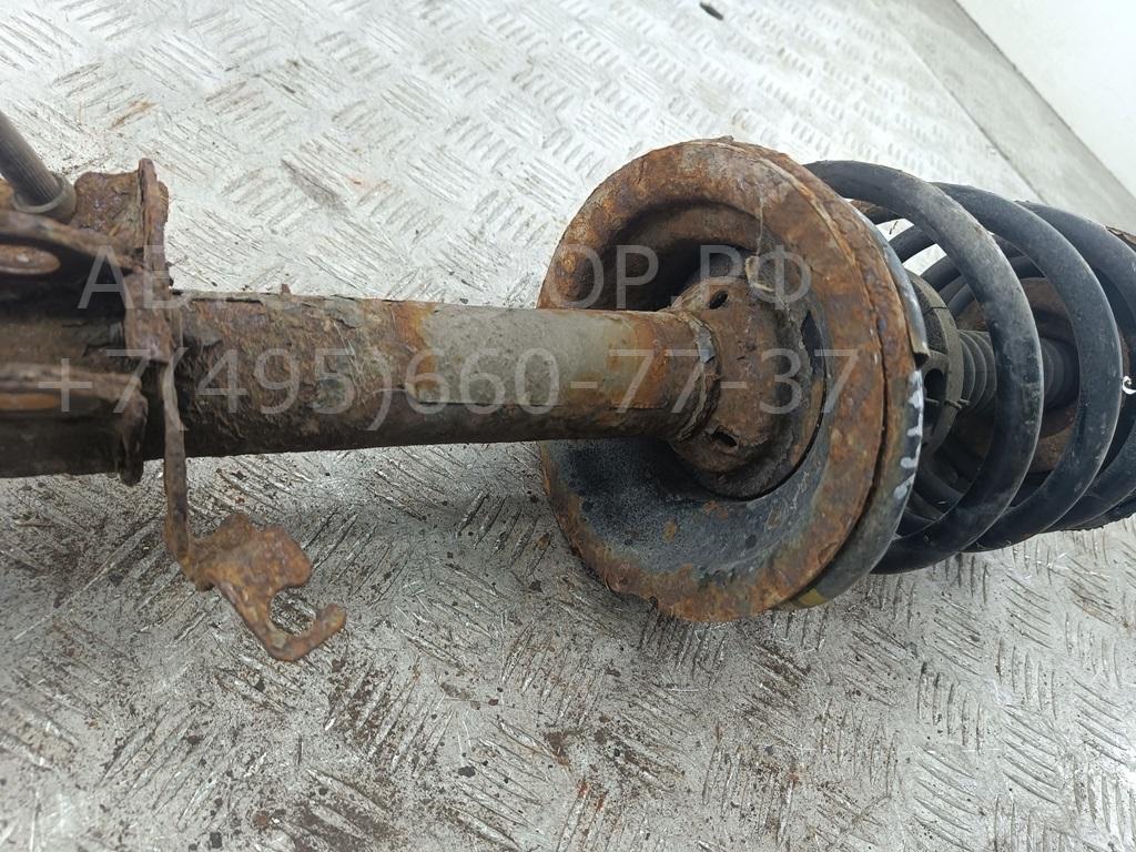 Амортизатор передний левый