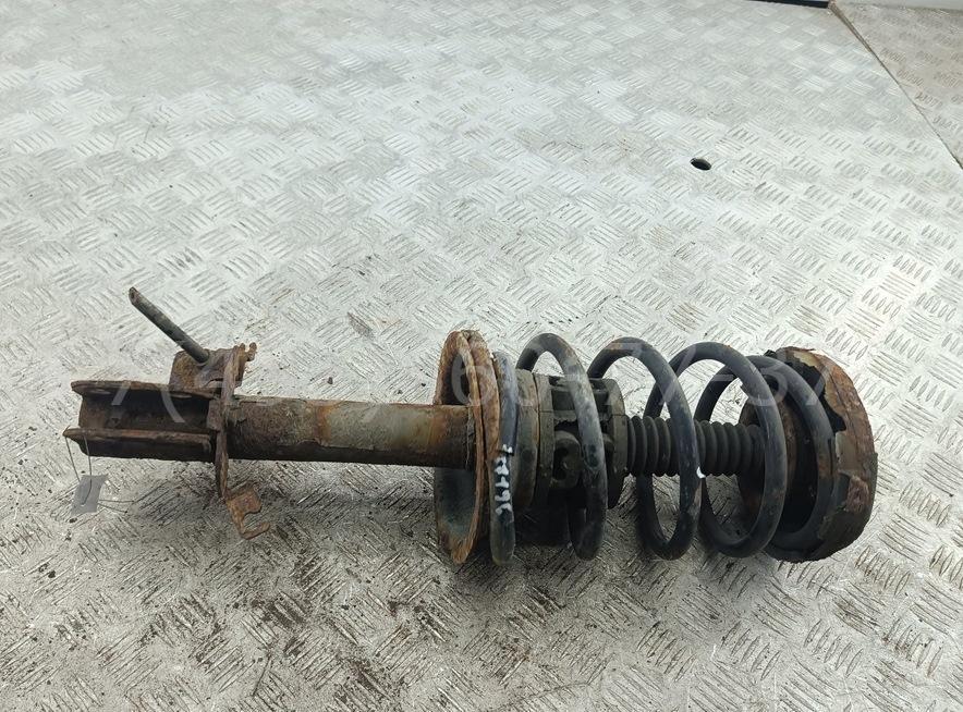 Амортизатор передний левый