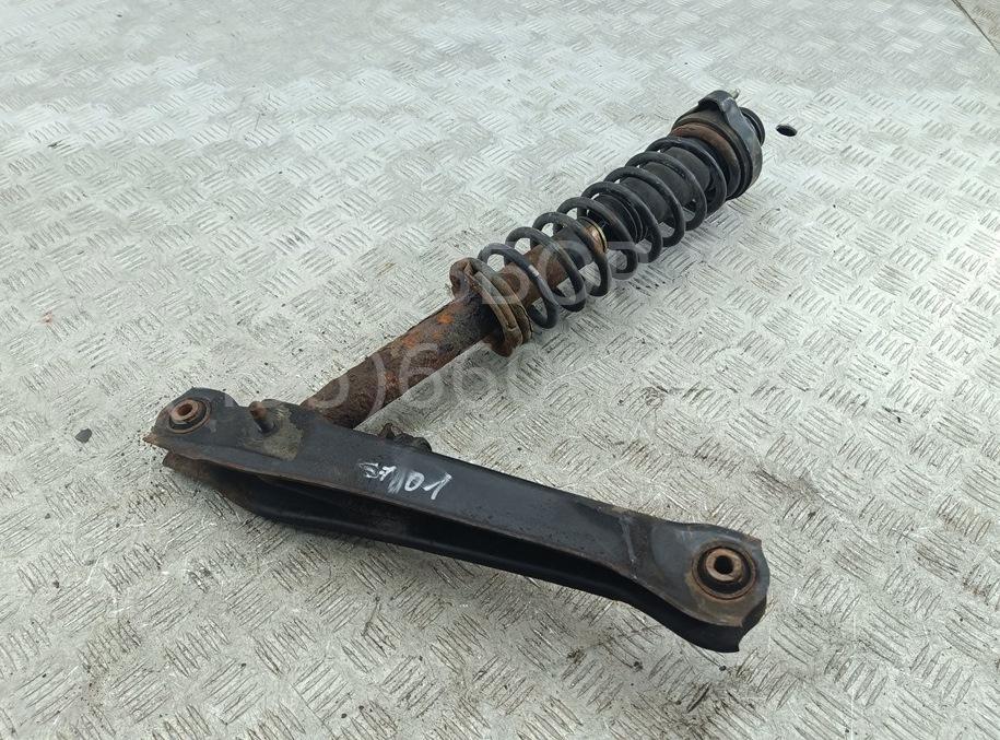 Амортизатор задний левый