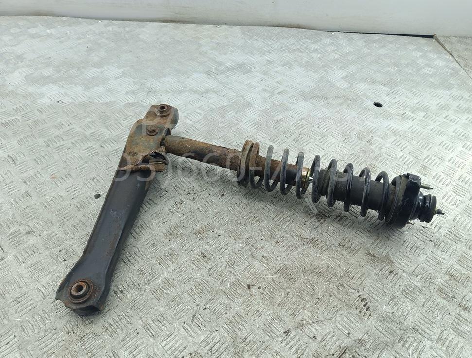 Амортизатор задний правый