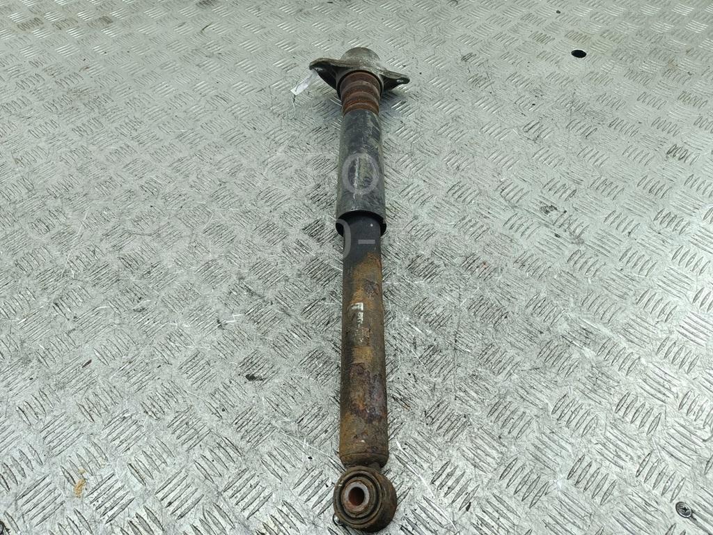 Амортизатор задний левый