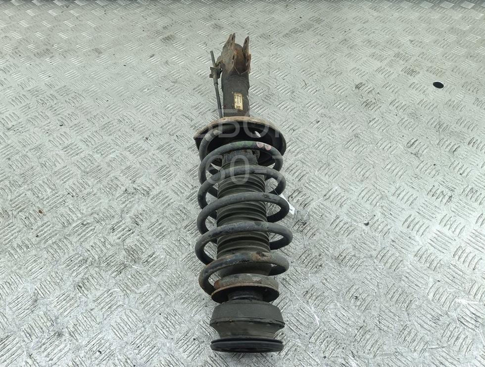 Амортизатор передний левый