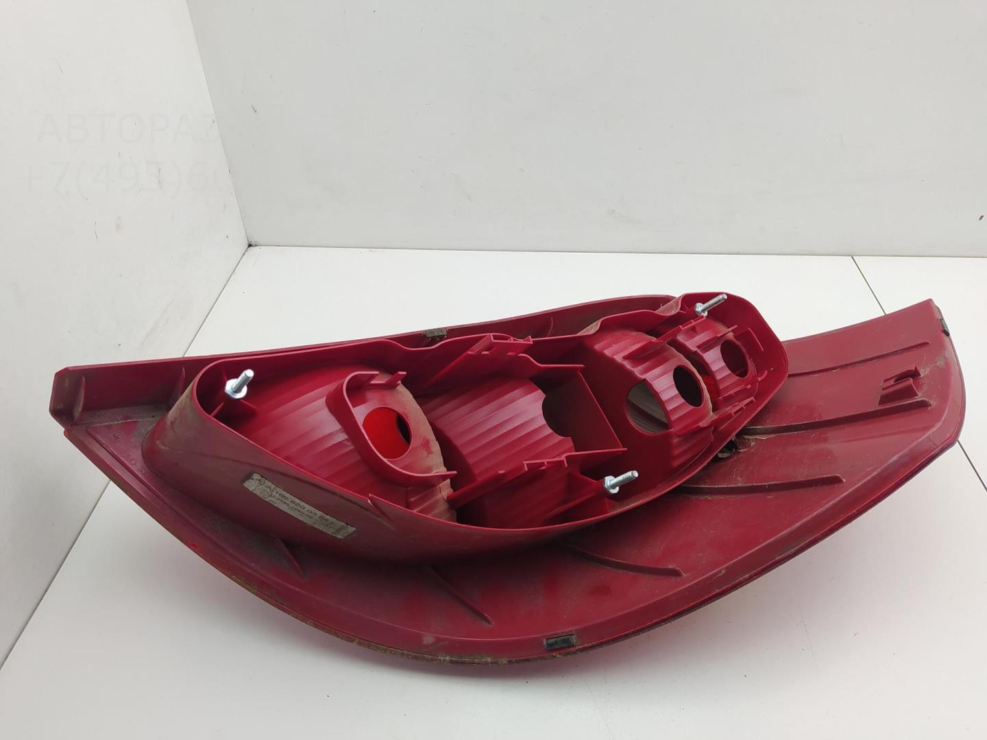 Фонарь задний левый