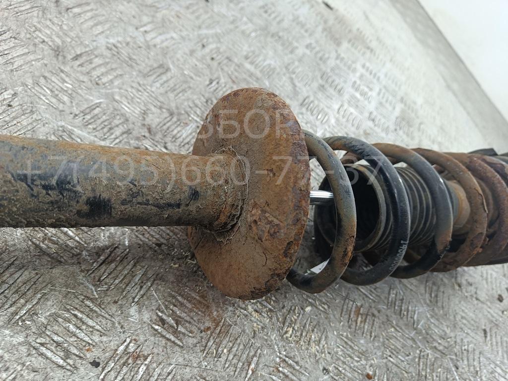 Амортизатор задний левый