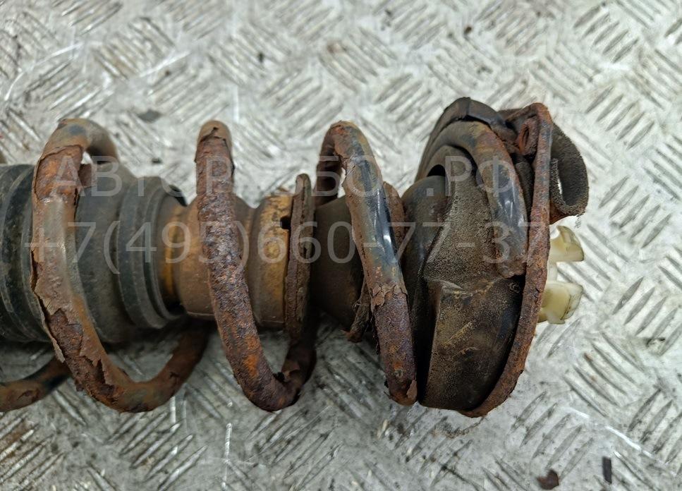 Амортизатор задний левый