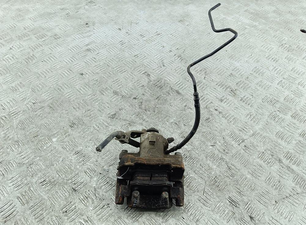 Суппорт задний левый