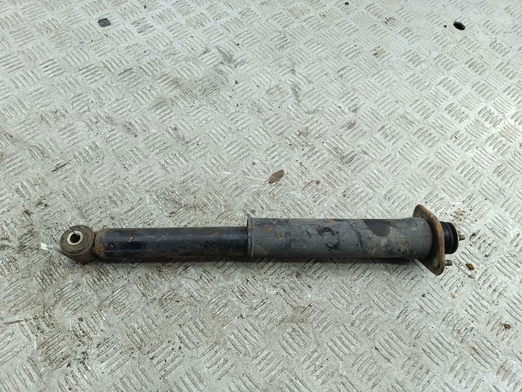 Амортизатор задний левый