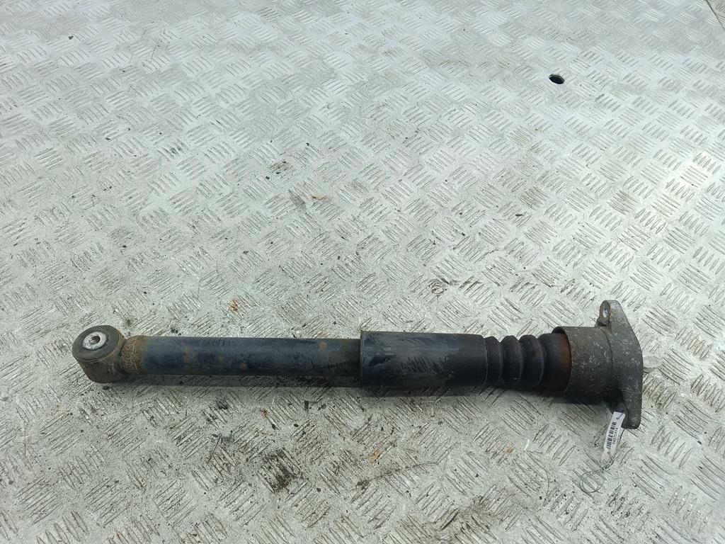 Амортизатор задний левый