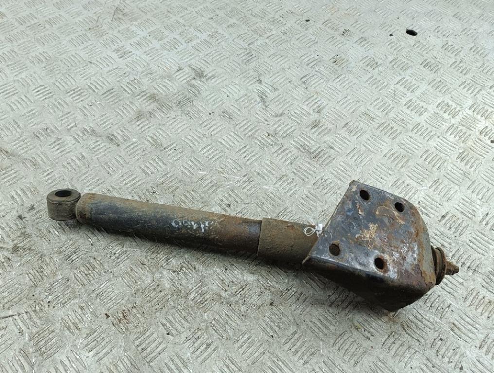 Амортизатор задний левый