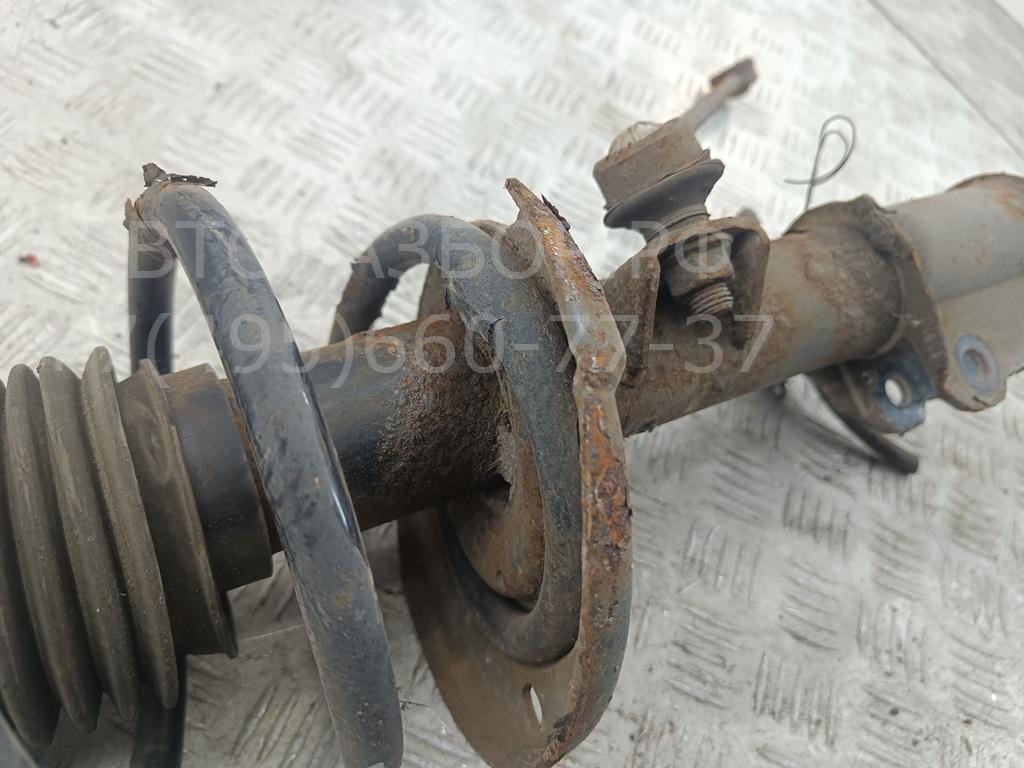 Амортизатор передний левый