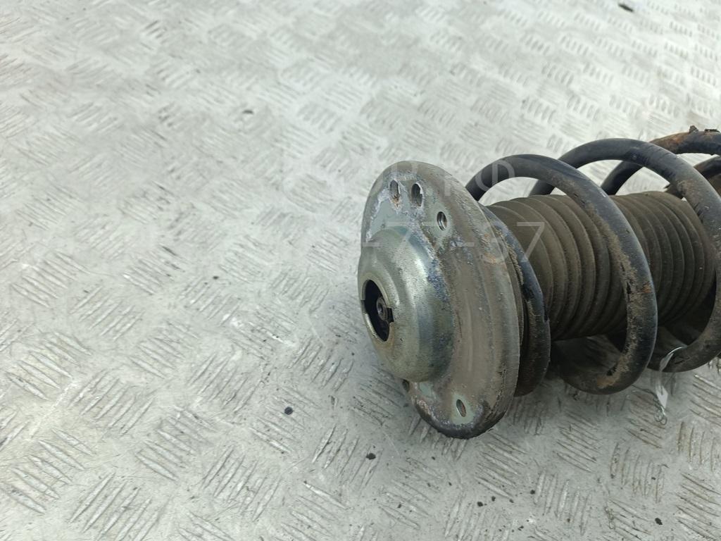 Амортизатор передний левый