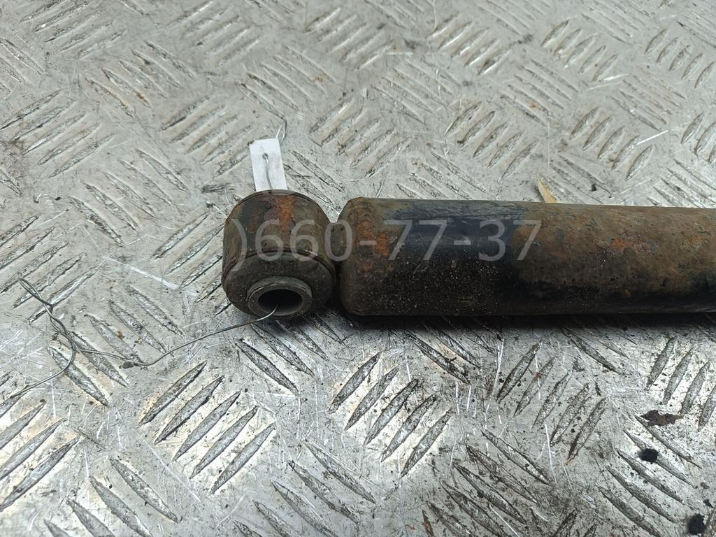 Амортизатор задний левый