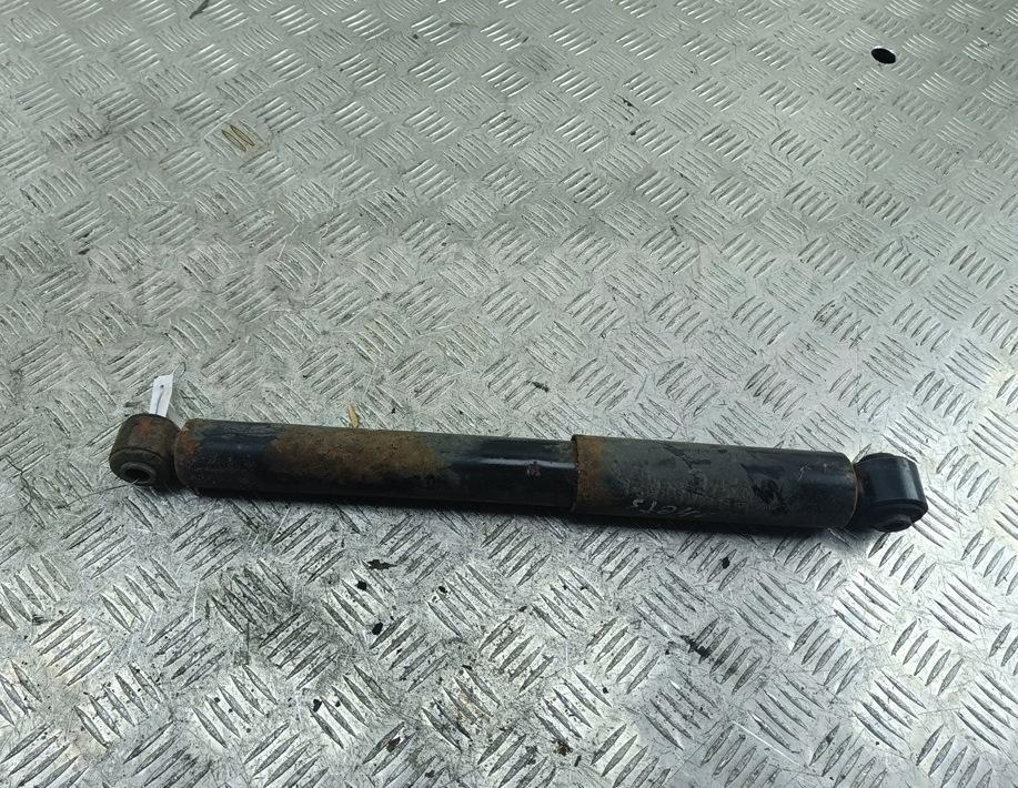 Амортизатор задний левый