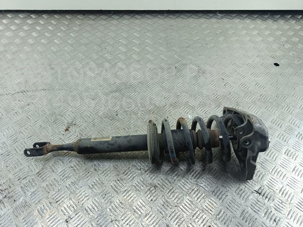 Амортизатор передний левый