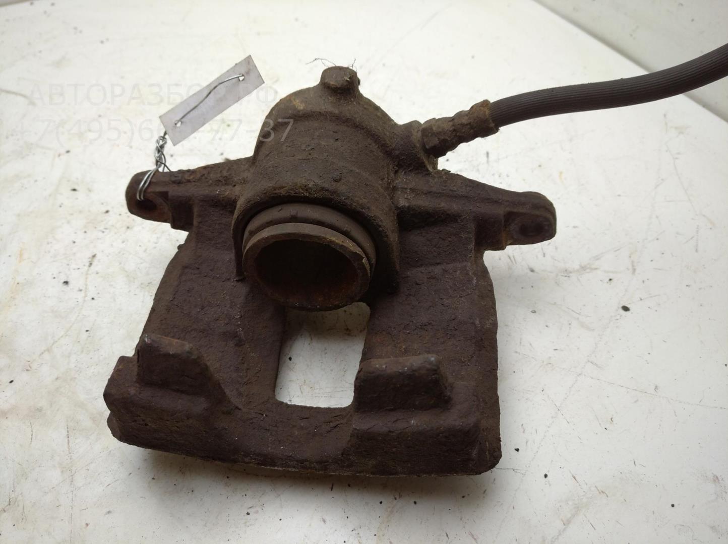 Суппорт задний левый