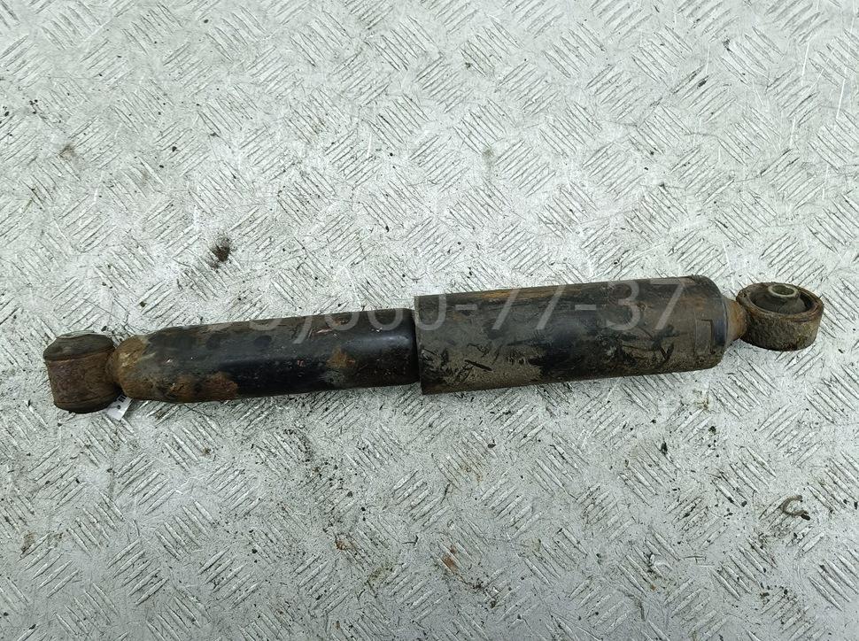 Амортизатор задний левый