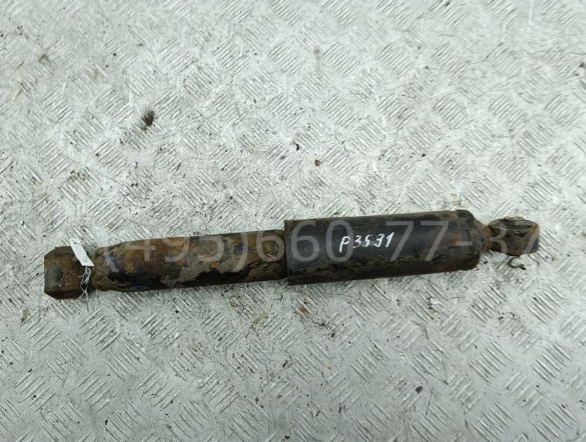 Амортизатор задний левый