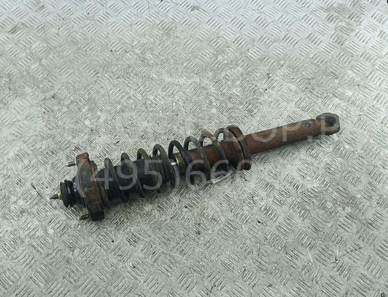 Амортизатор задний левый