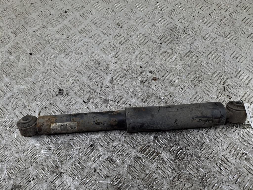 Амортизатор задний левый