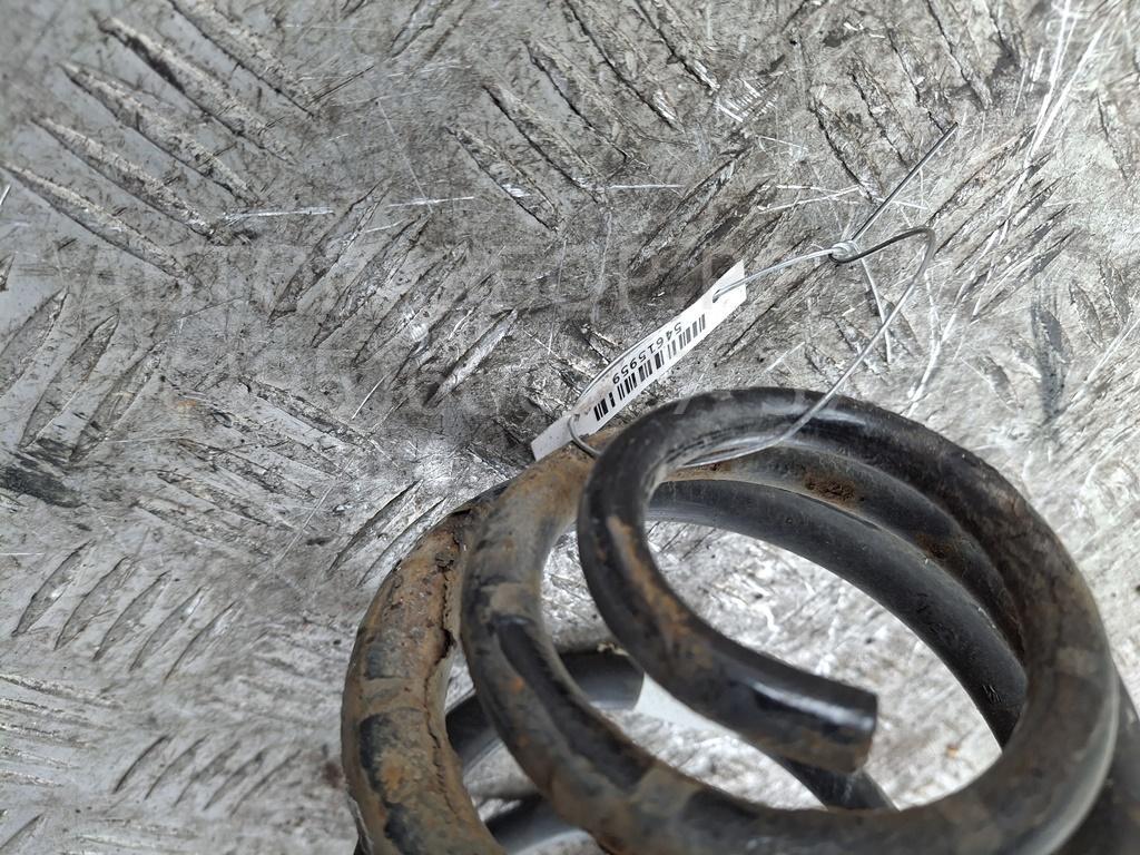 Пружина задняя