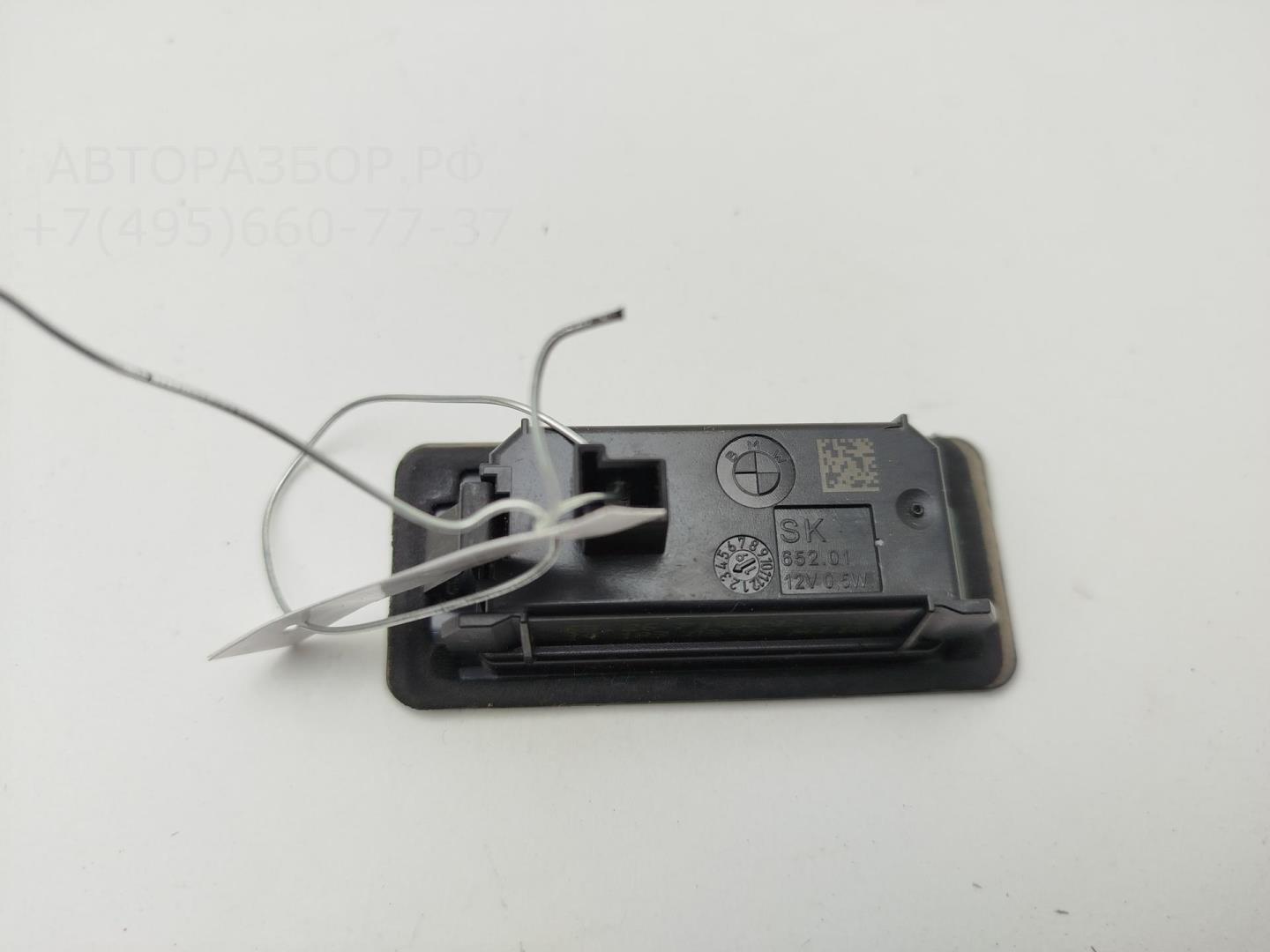 Фонарь подсветки номера