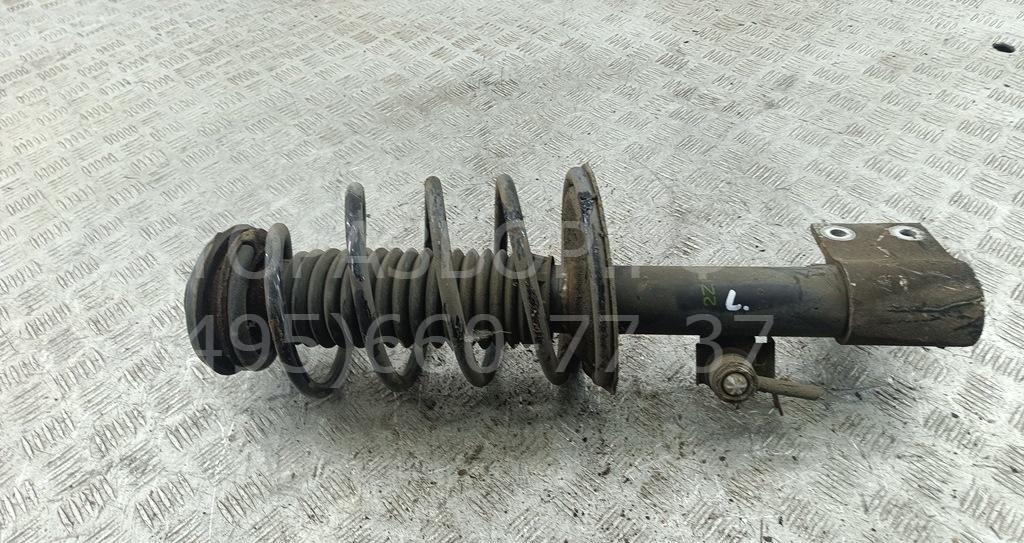 Амортизатор передний левый