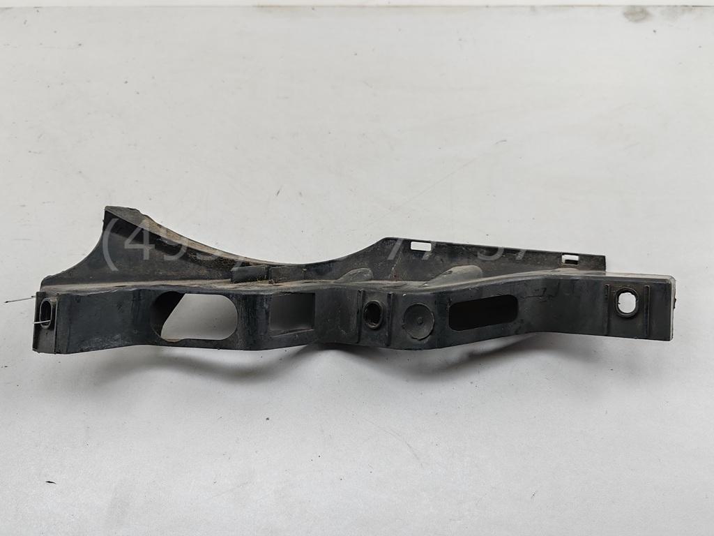 Кронштейн переднего бампера левый