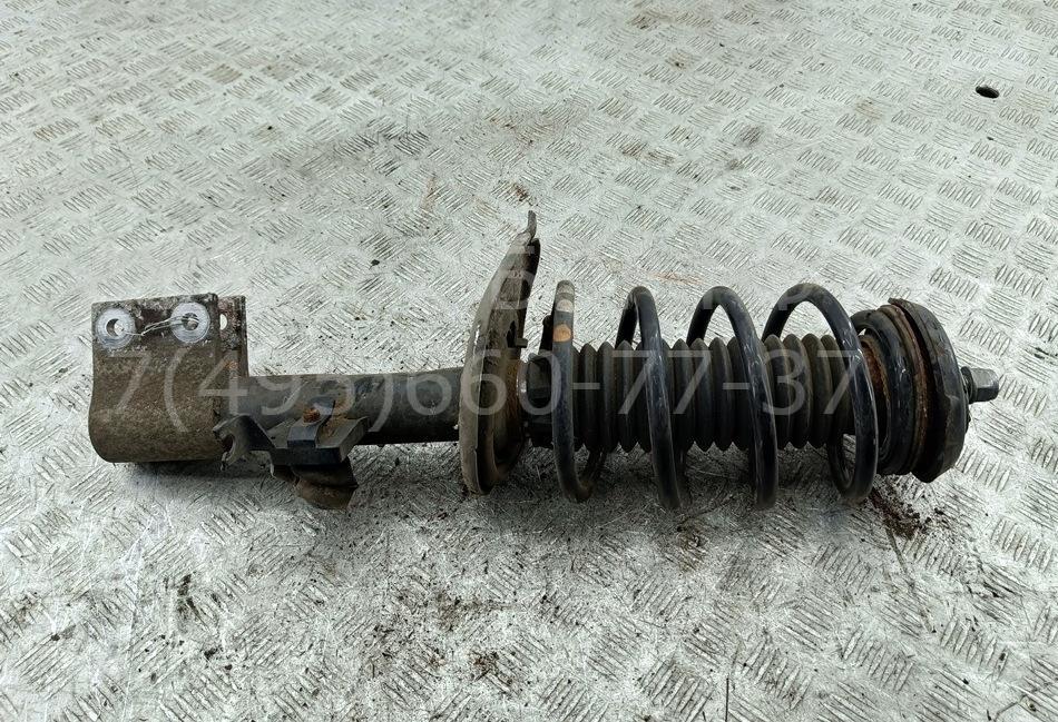 Амортизатор передний левый