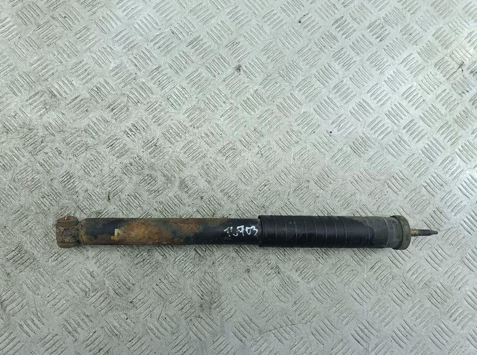 Амортизатор задний левый