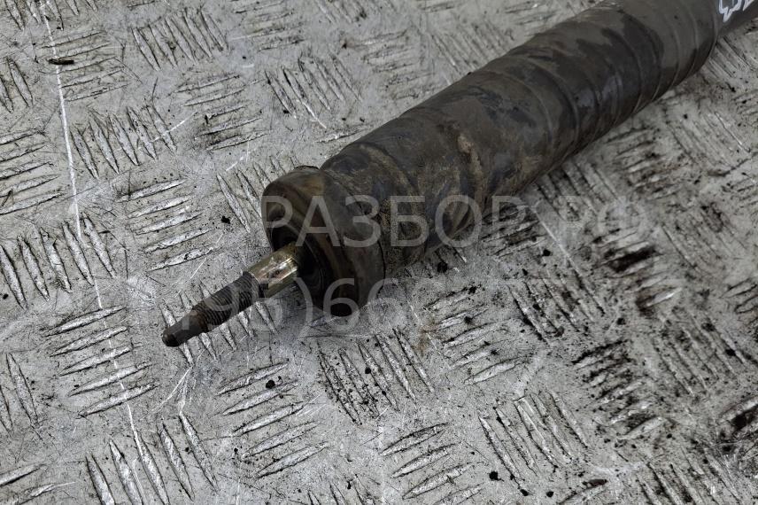 Амортизатор задний левый